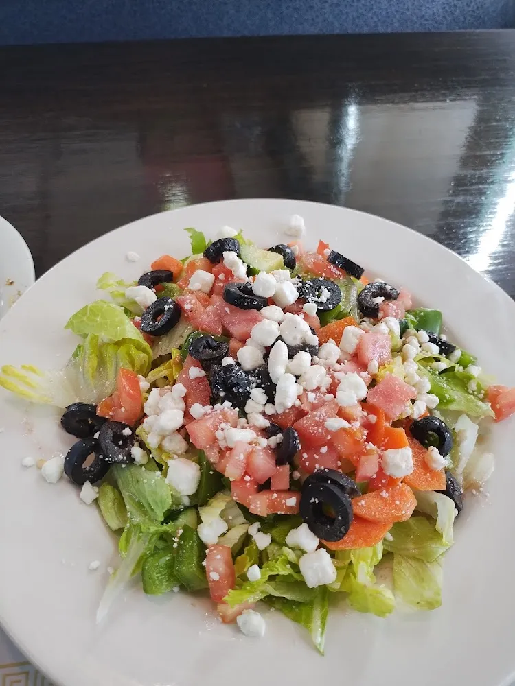 Tri Color Greek Salad in a Tortilla Shell